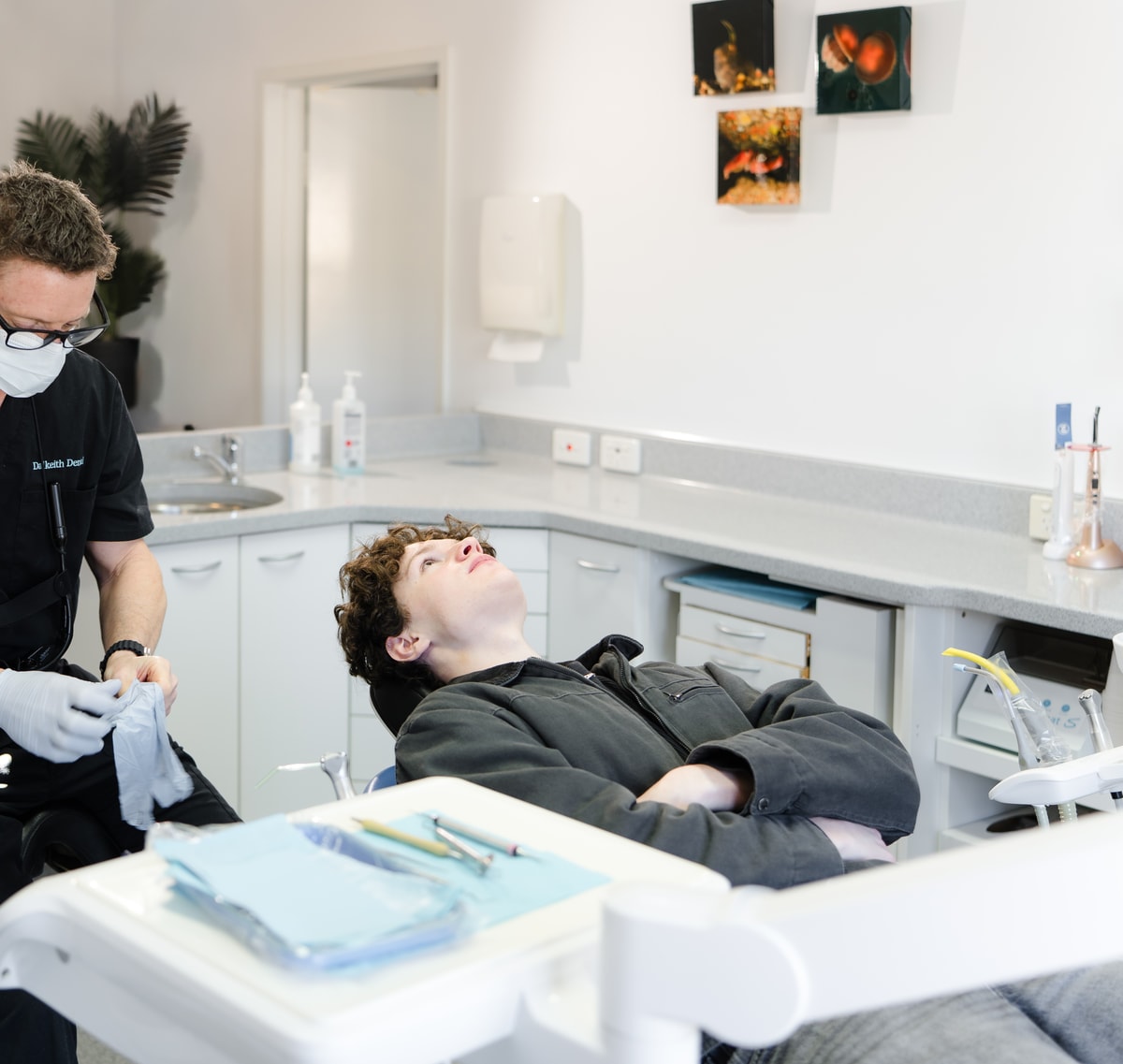 Dalkeith Dental clinician providing care to a patient in the dental chair