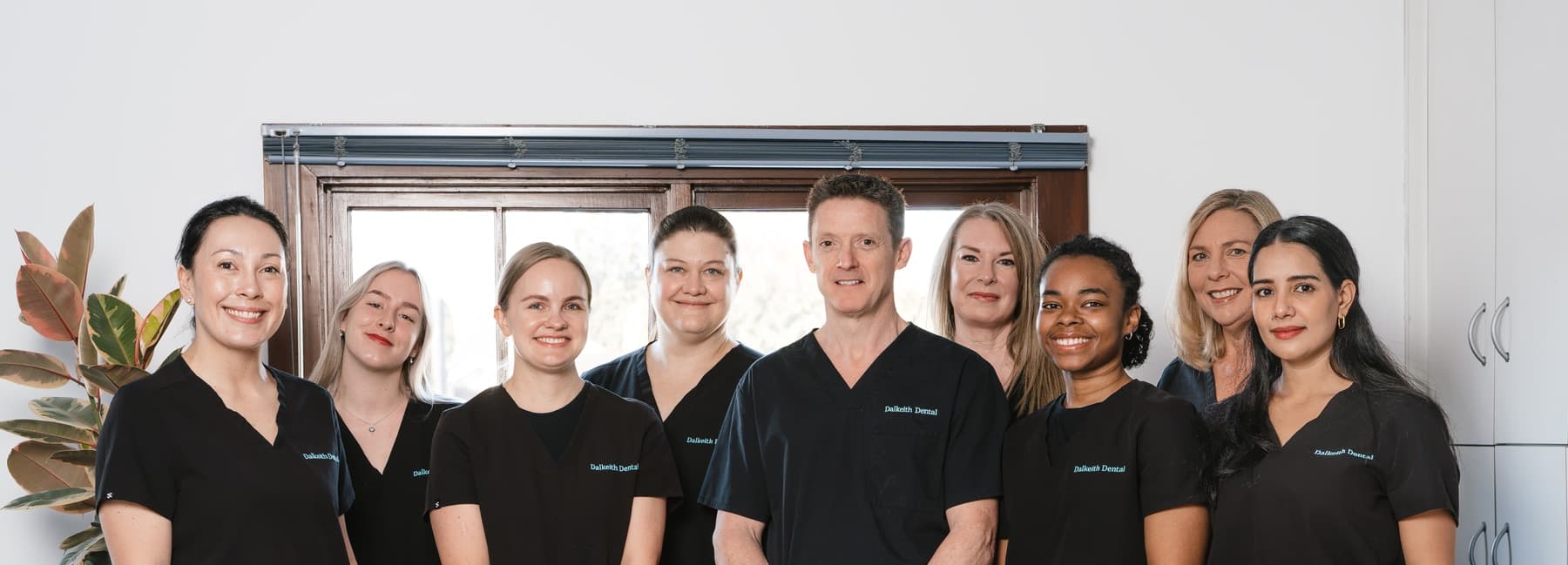 Dalkeith Dental team standing together outside the practice