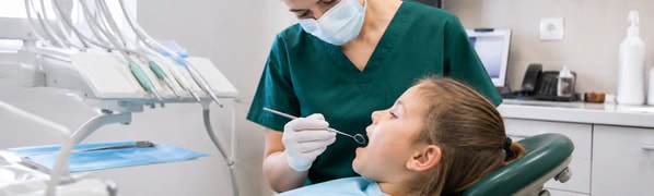Dalkeith Dental clinician providing preventive care for a child patient