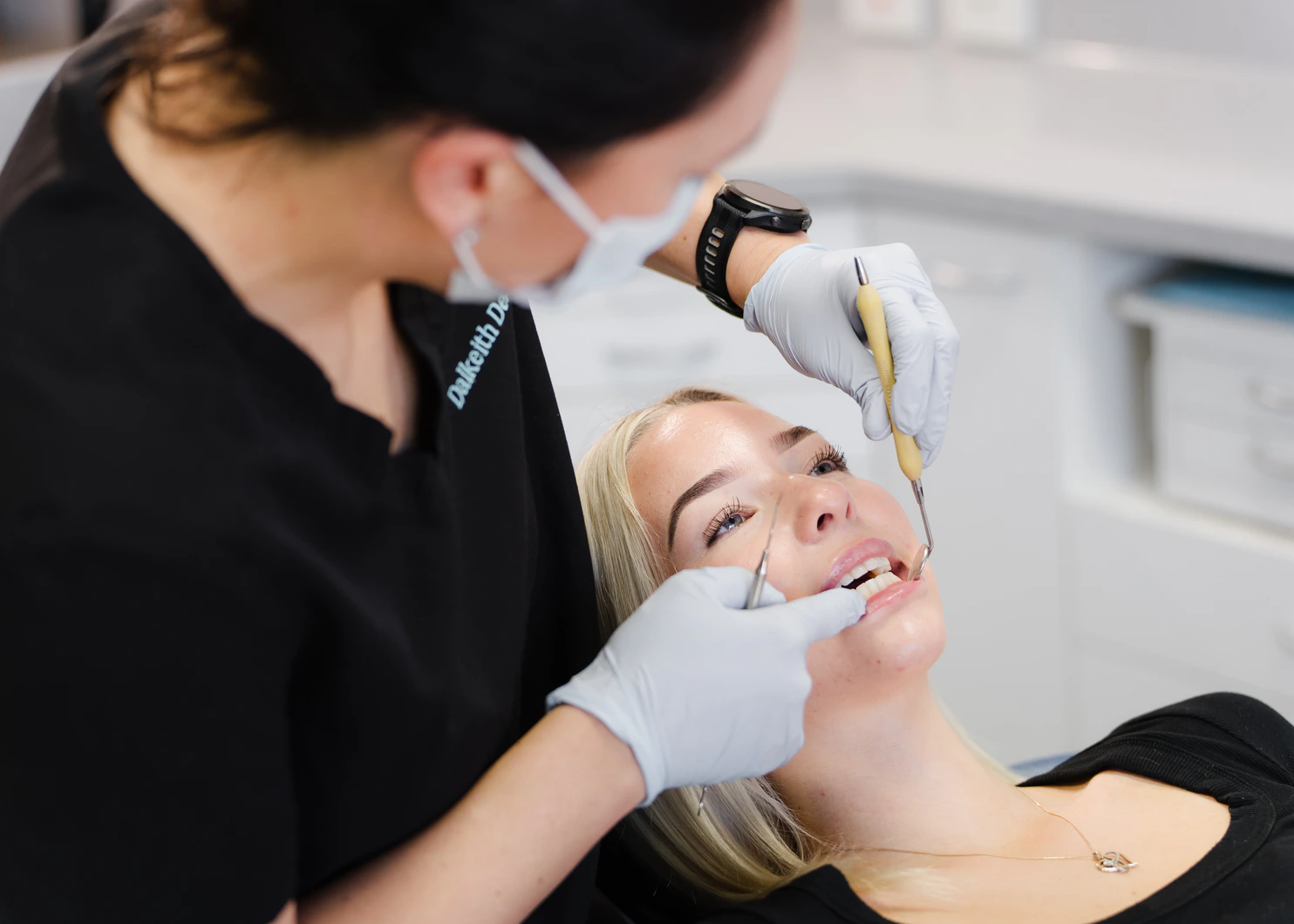 Dalkeith Dental clinician carrying out close tooth repair work