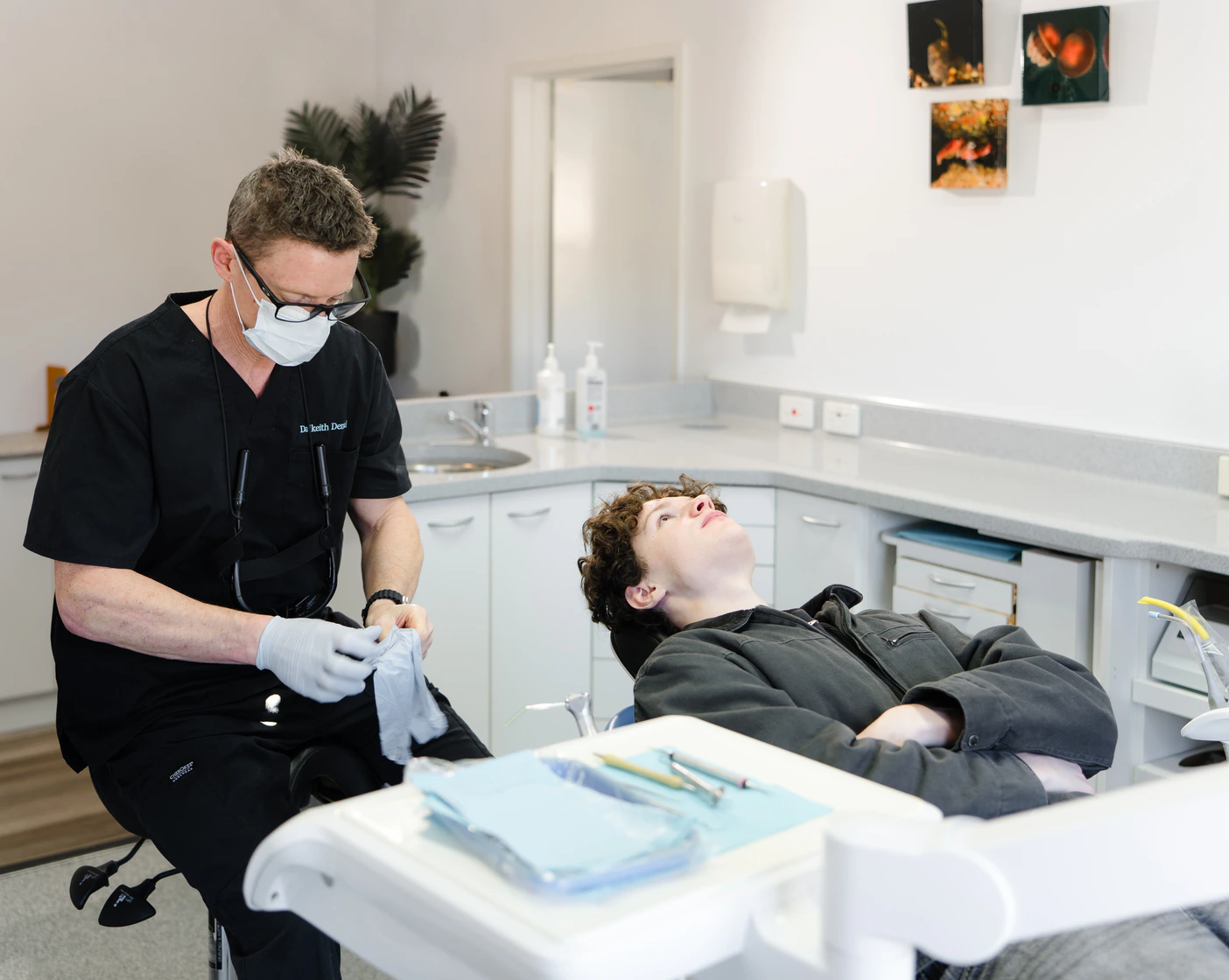 Dalkeith Dental clinician providing care to a patient in the dental chair